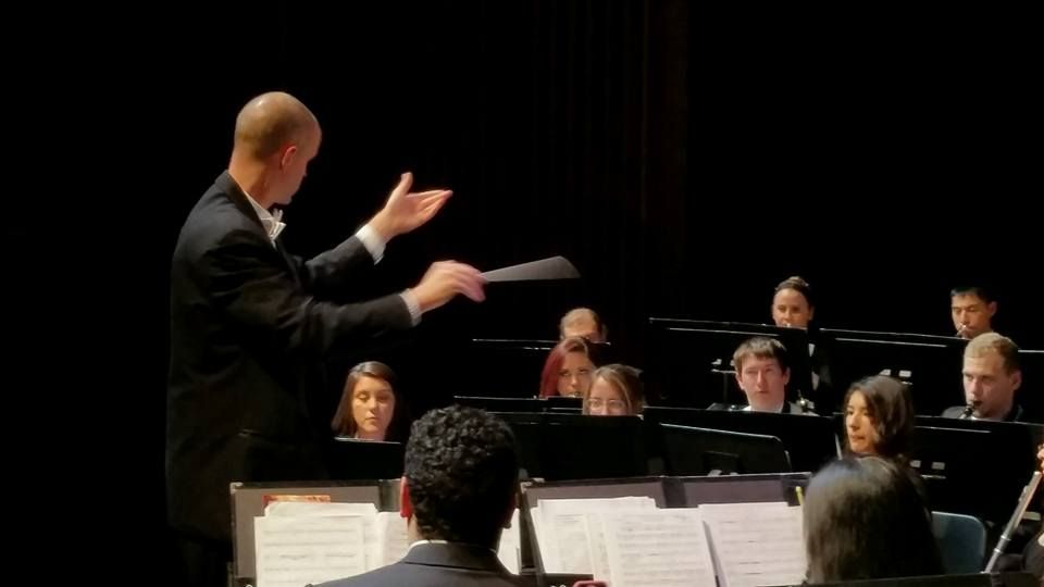 Dr. Shuey conducting a concert band