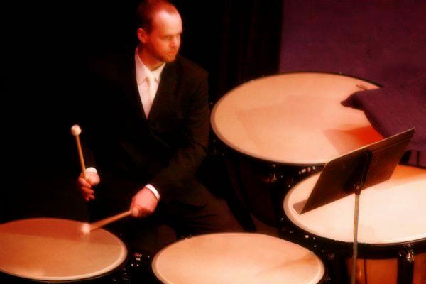 Dr. Shuey playing timpani